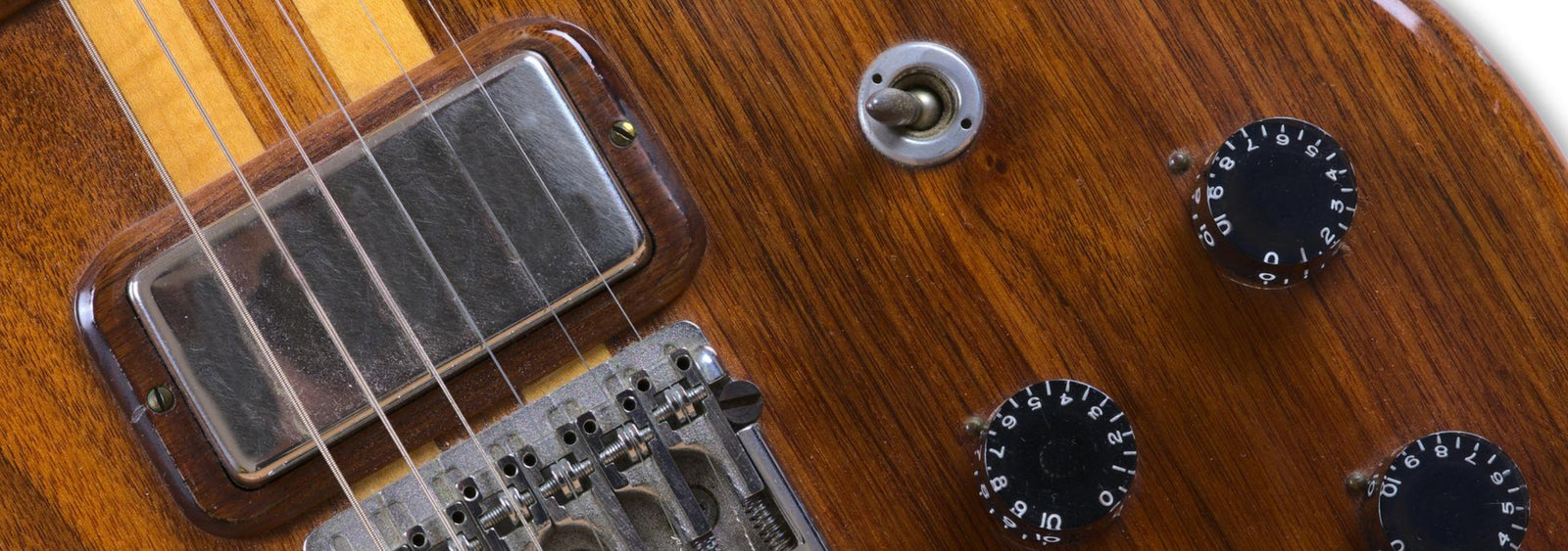 closeup of guitar pickup closeup of guitar pickup
