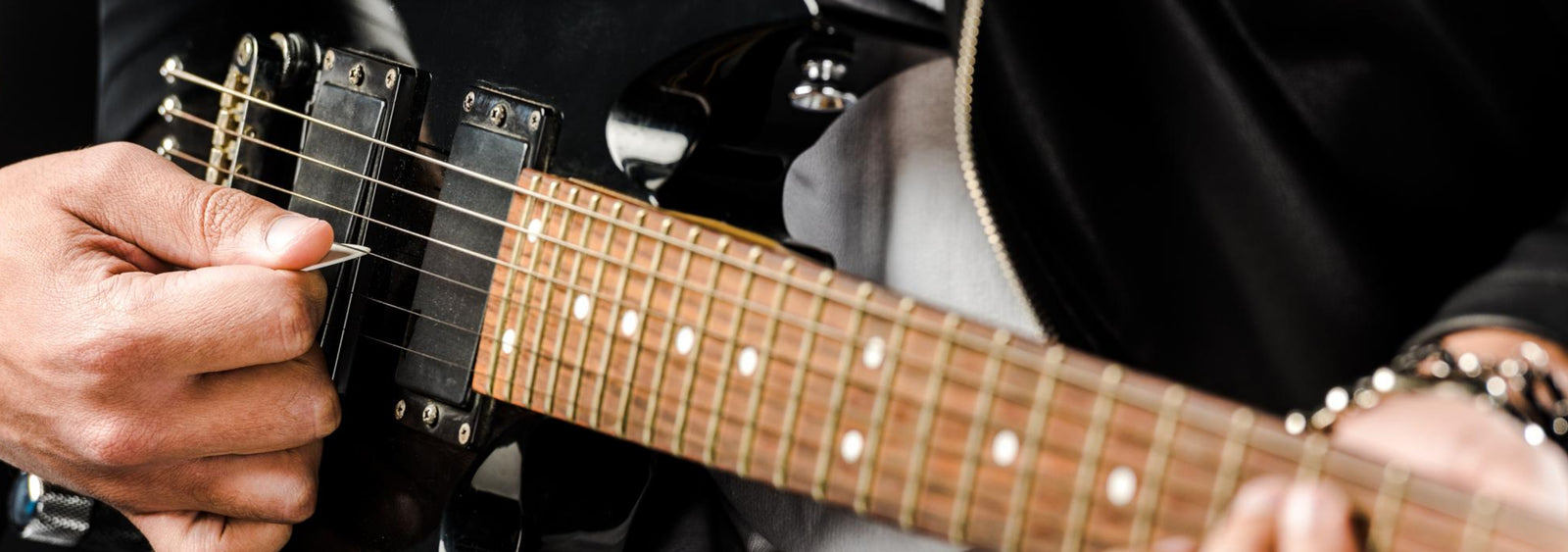 Black guitar getting played Black guitar getting played