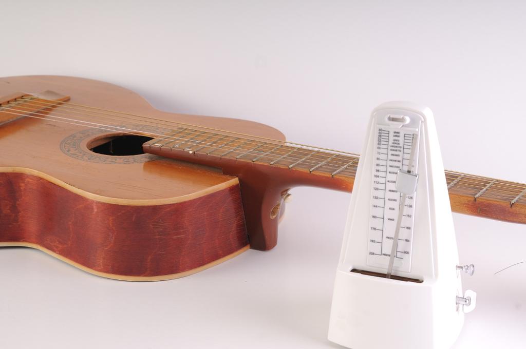a metronome and guitar a metronome and guitar