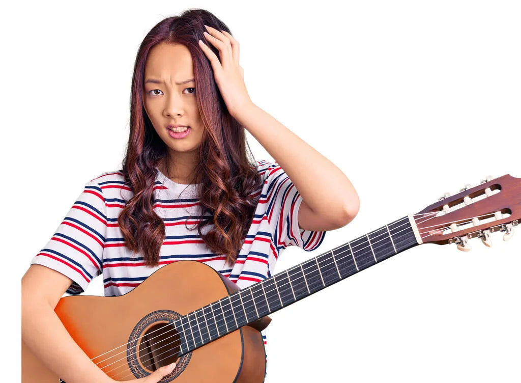 Upset female guitarist Upset female guitarist