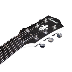 Close-up of the headstock of the Godin Rik Emmett Premiere Electric Guitar in black, showcasing silver tuning pegs, a fleur-de-lis design, and the "Godin" logo.