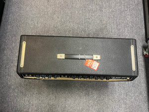 A 1966 Fender Twin Reverb 2-Channel 85-Watt 2x12" Guitar Combo Amp w/Flight Case by Fender sits on a gray carpet with a top handle and red "Sale $2099" tag, boasting classic vintage spring reverb tones.