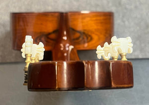 Close-up view of the back of a 1976 S Yairi No. 880 Classical Guitar headstock, made in Japan, showing tuning pegs and part of the Brazilian rosewood neck.