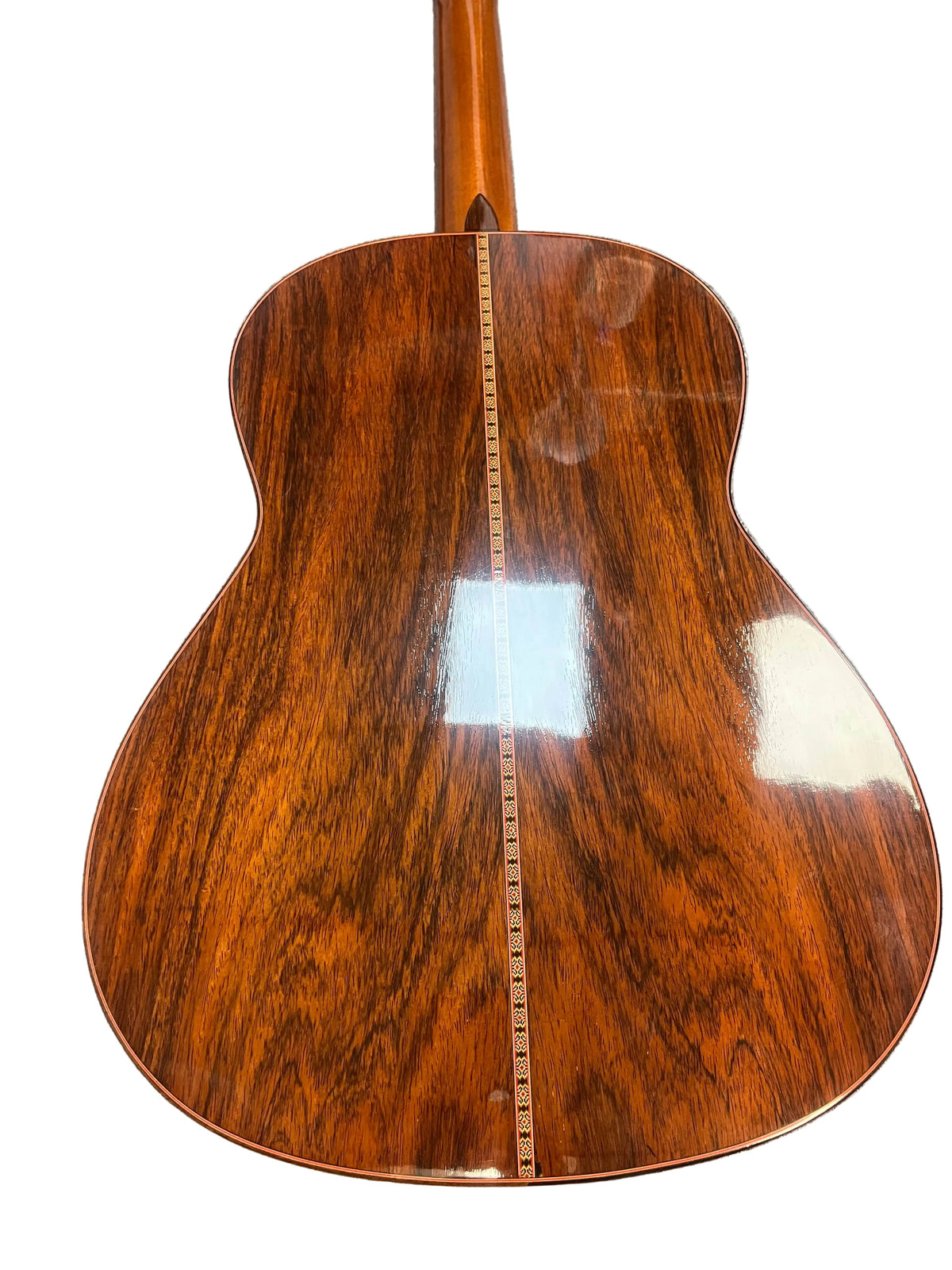 Back view of a 1976 S. Yairi No. 880 Classical Guitar by S Yairi, made in Japan, with a glossy dark Brazilian rosewood finish and decorative center inlay.
