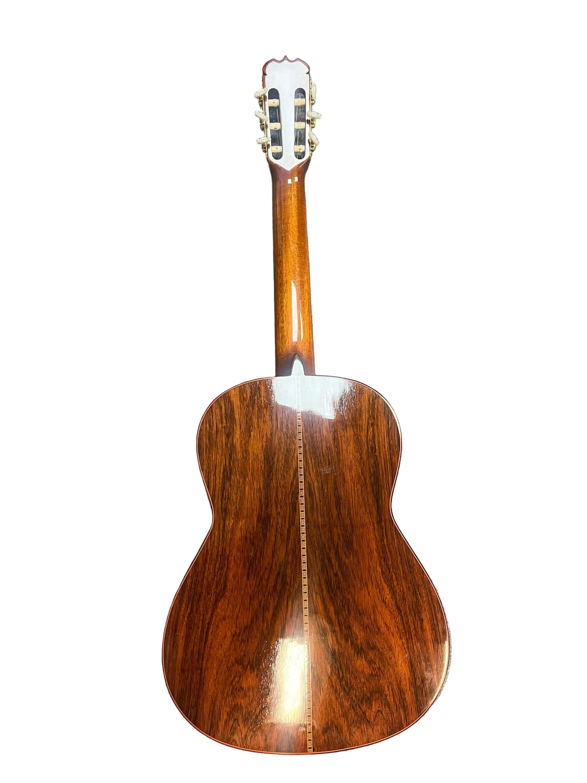 The back of a 1976 S. Yairi No. 880 Classical Guitar is shown, displaying polished Brazilian rosewood with visible grain and tuning pegs at the headstock—a fine example by S Yairi, made in Japan.