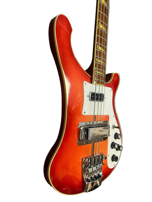 1978 Rickenbacker 4001 Bass in Fireglo (Serial RL7346) with white pickguard, chrome bridge, and control knobs, photographed against a white background. Comes with original hard shell case (OHSC).