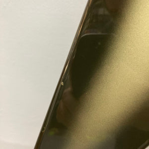 1979 Gibson Flying V Silverburst guitar close-up, showcasing its shiny surface and minor blemishes, with original case included.
