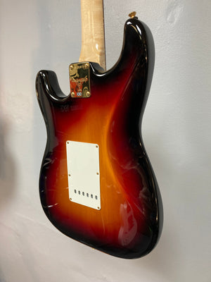 Close-up of a 1998 Fender Custom Shop 1960s FMJ Stratocaster, highlighting meticulous craftsmanship and vintage-inspired design. Includes original case and certificate of authenticity.