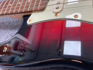 Close-up of the Fender Custom Shop 1960s FMJ Stratocaster 1998 guitar neck and body, showcasing meticulous craftsmanship and vintage design.