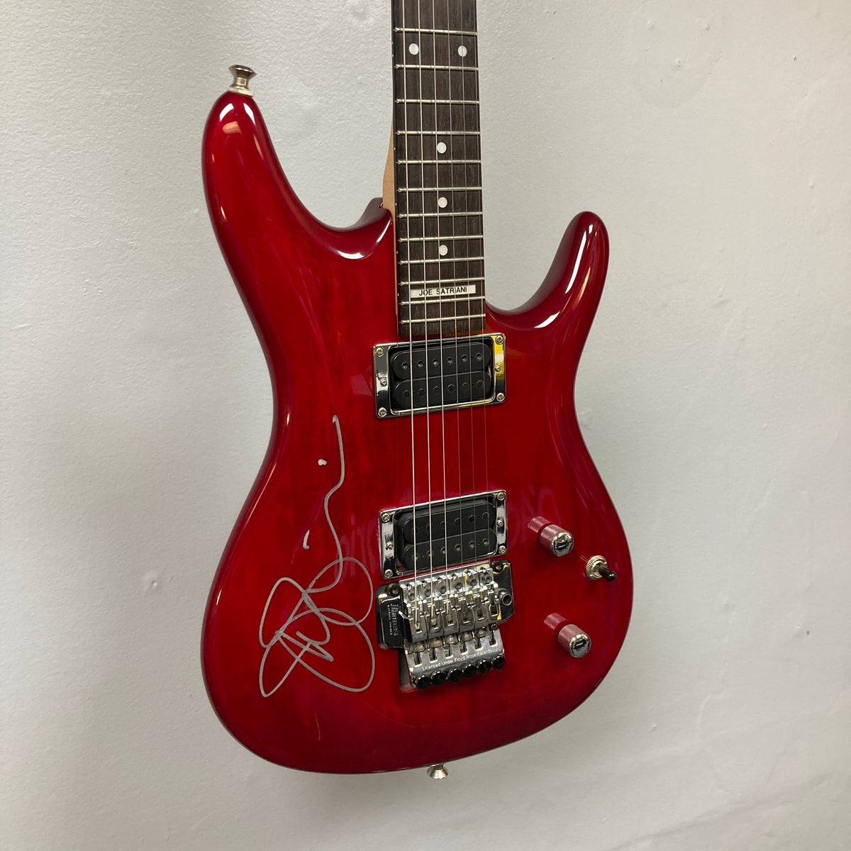 1999 Ibanez JS100 – Trans Red – Signed by Joe Satriani w/case