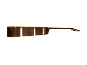 Side view of a 2005 Collings CJ BaA acoustic guitar, featuring Brazilian rosewood back and sides with an Adirondack spruce top, shown flat against a white background.