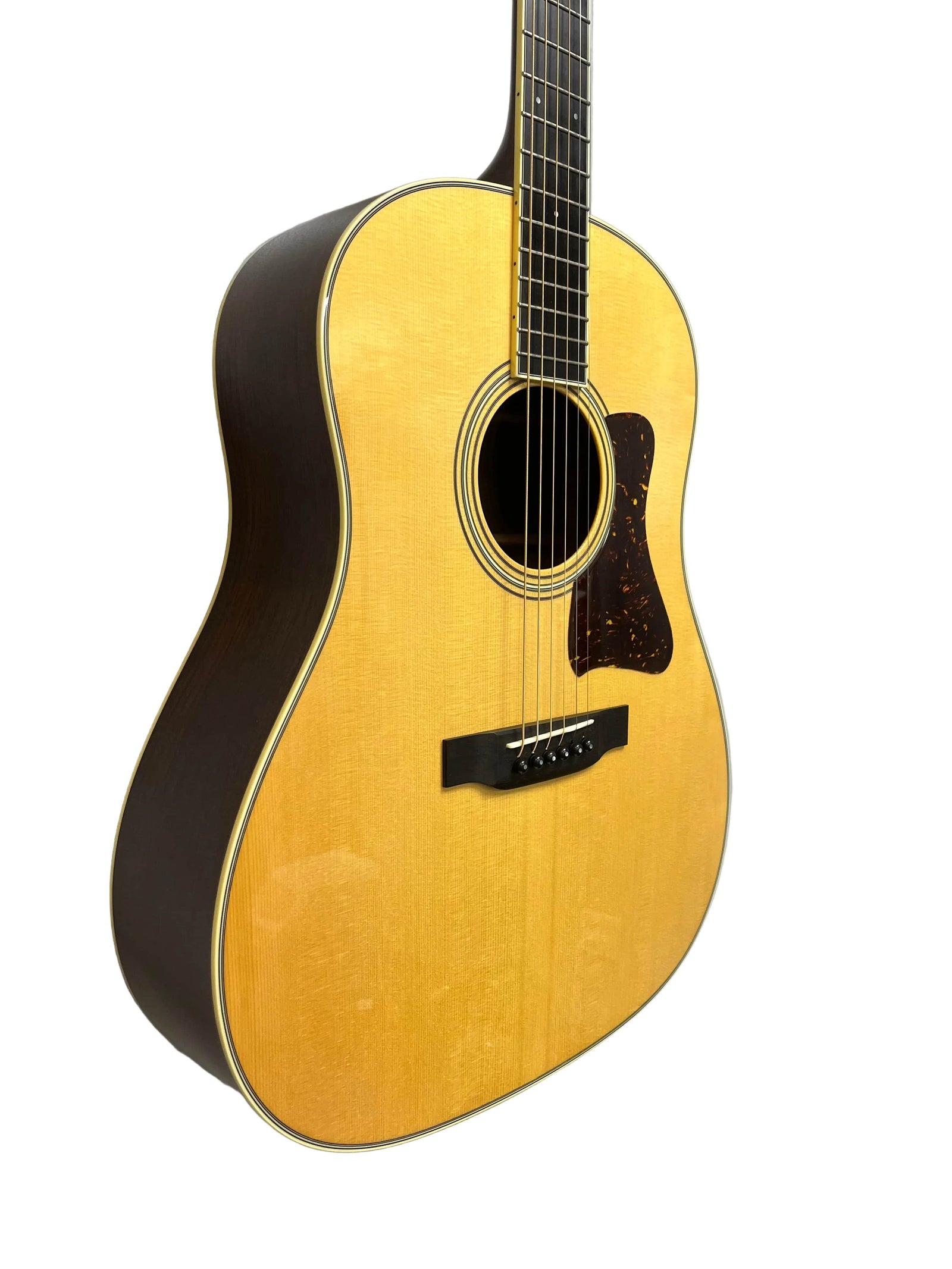 The 2005 Collings CJ BaA acoustic guitar features Brazilian rosewood back and sides, an Adirondack spruce top, natural wood finish, black fretboard, tortoiseshell pickguard, and six strings—shown beautifully against a white background. The 2005 Collings CJ BaA acoustic guitar features Brazilian rosewood back and sides, an Adirondack spruce top, natural wood finish, black fretboard, tortoiseshell pickguard, and six strings—shown beautifully against a white background.