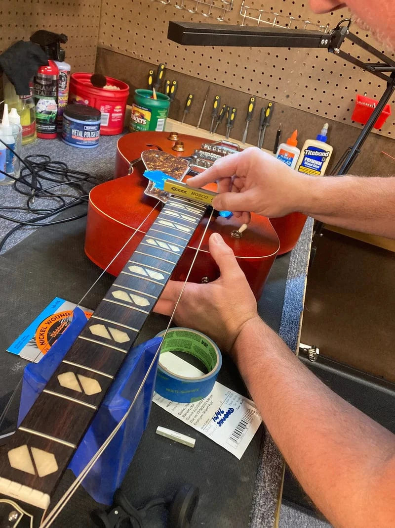 Guitar getting fret work Guitar getting fret work