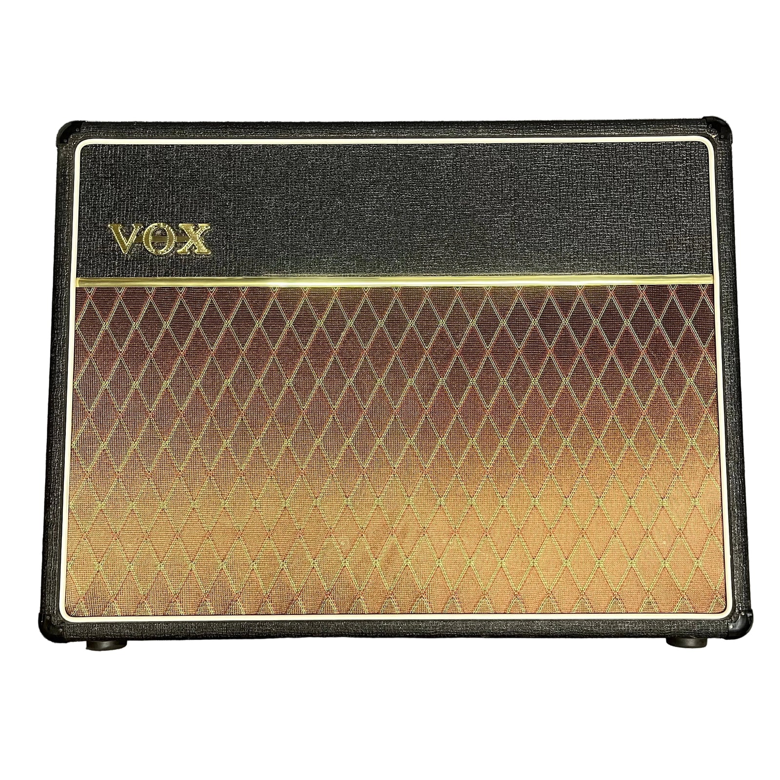 The 2004 Vox AC30/6TB, made in England, features a black control panel, gold VOX logo, brown diamond-pattern grille cloth, and legendary Celestion Alnico Blues speakers. The 2004 Vox AC30/6TB, made in England, features a black control panel, gold VOX logo, brown diamond-pattern grille cloth, and legendary Celestion Alnico Blues speakers.