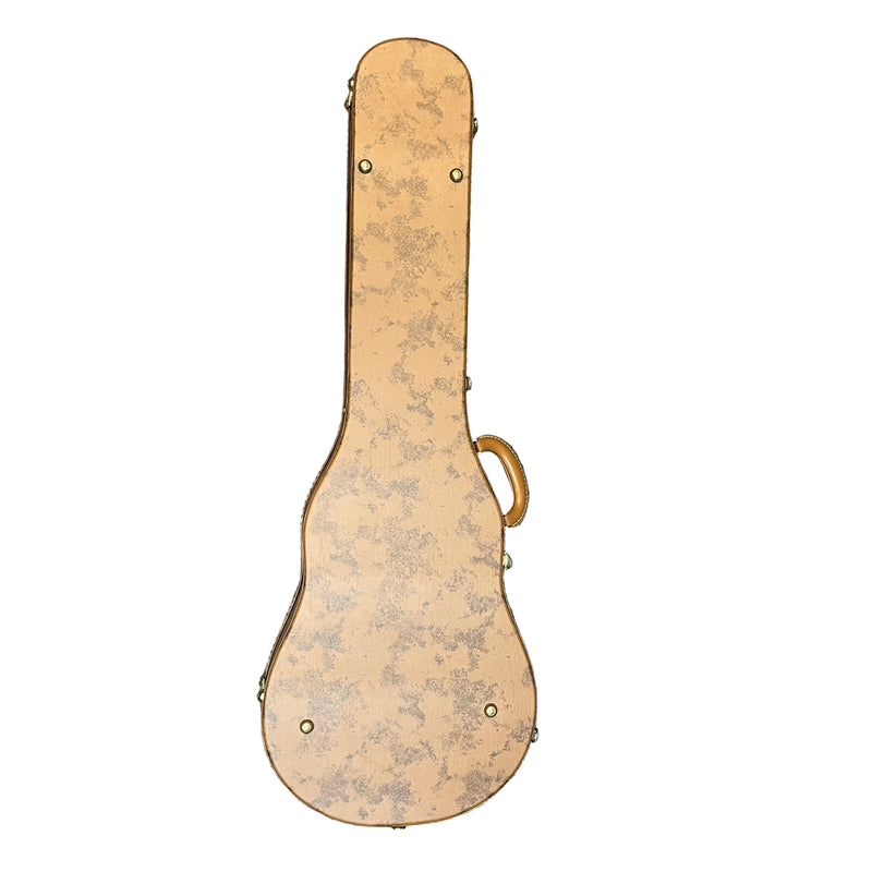 The Gibson 5-Latch Brown/Pink Hardshell Case for Les Paul features a tan, mottled exterior and brass-colored hardware, shown here against a white background.