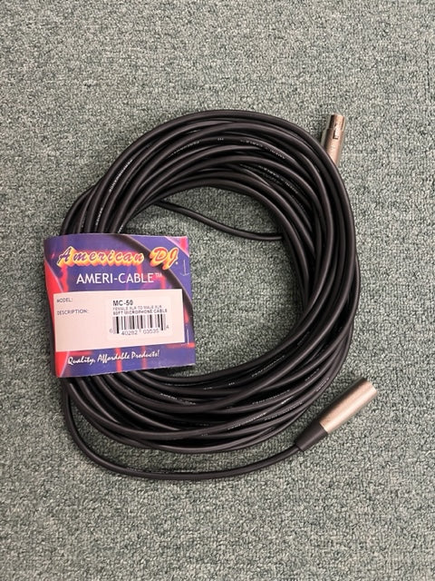 A coiled American DJ MC-50 50ft XLR Microphone Cable with its packaging label attached is displayed on a carpeted floor.
