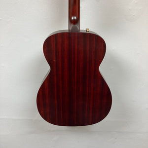 Close-up of Seagull M6 Ltd Ruby Red CH EQ SF guitar showcasing its solid cedar top and mahogany sides, highlighting the intricate craftsmanship and elegant finish.