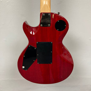 Rear view of an ESP Standard Eclipse Transparent Cherry Red electric guitar by Esp, showing open rear cavity covers with internal compartments, against a plain light background. Includes case.