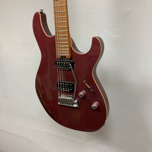 A Cort FW-G300 PRO Vivid Burgundy electric guitar with a maple neck, two humbucker pickups, and chrome hardware is mounted on a white wall.