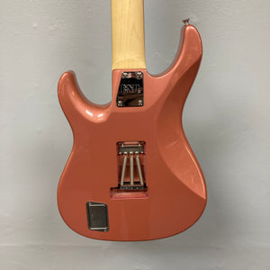 Back of an Edwards E-SN7-194MF Mikio Fujioka Signature seven-string guitar in Burgundy Mist, featuring a visible metal neck plate, spring cavity, and rectangular compartment, shown against a plain light gray wall.