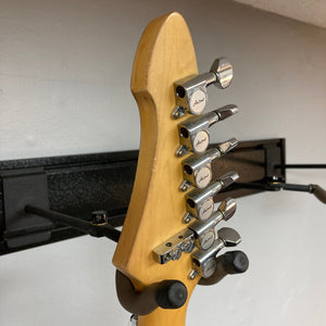 ARIA PRO II STG-02-3C used electric guitar on stand, showcasing its versatile Humbucker-Single-Single pickup configuration and Floyd Rose licensed tremolo system.