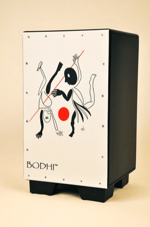 The Bodhi Cajon Drum - Art Collection #4 by Bodhi features a black rectangular design with a white front panel, decorated with abstract black and white figures, a red dot, and diagonal red line—perfect for any art collection or cajon enthusiast.