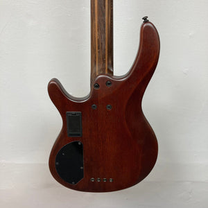 Close-up of Cort Artisan B4 Element Natural bass guitar, showcasing its roasted maple fretboard, MetalCraft M4 bridge, and Bartolini MK-1 pickups.