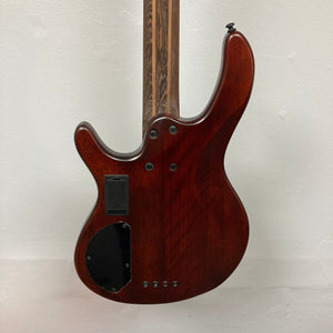 Cort Artisan B4 Element bass guitar close-up showcasing strings, pickups, and bridge with detailed craftsmanship and premium materials.