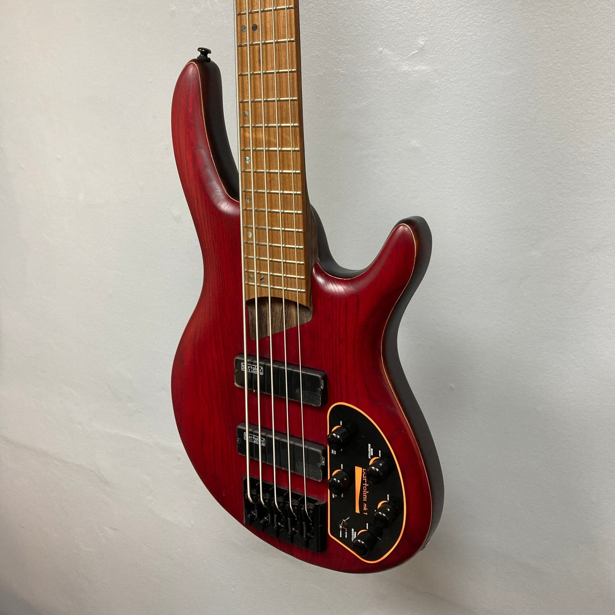 Cort B5 Artisan Element Open Pore Burgundy Red Bass Guitar with roasted maple fretboard, 5-piece neck, Bartolini pickups, and Hipshot tuners.