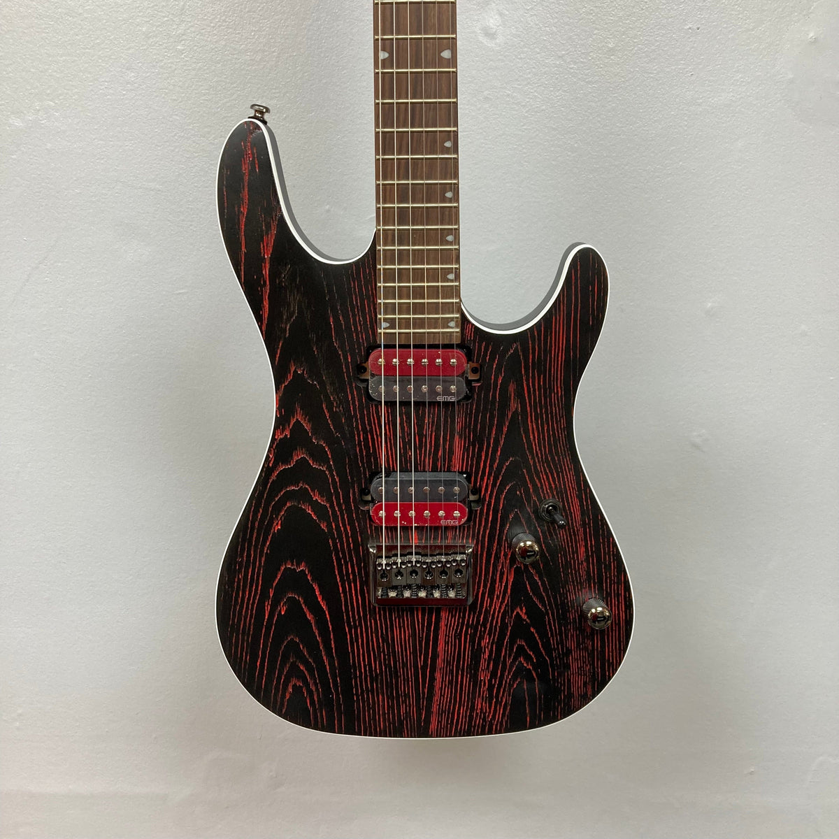 Cort KX300 EBR Etched Black Red electric guitar with ash top, bolt-on neck, and EMG® RetroActive Super77 humbuckers.