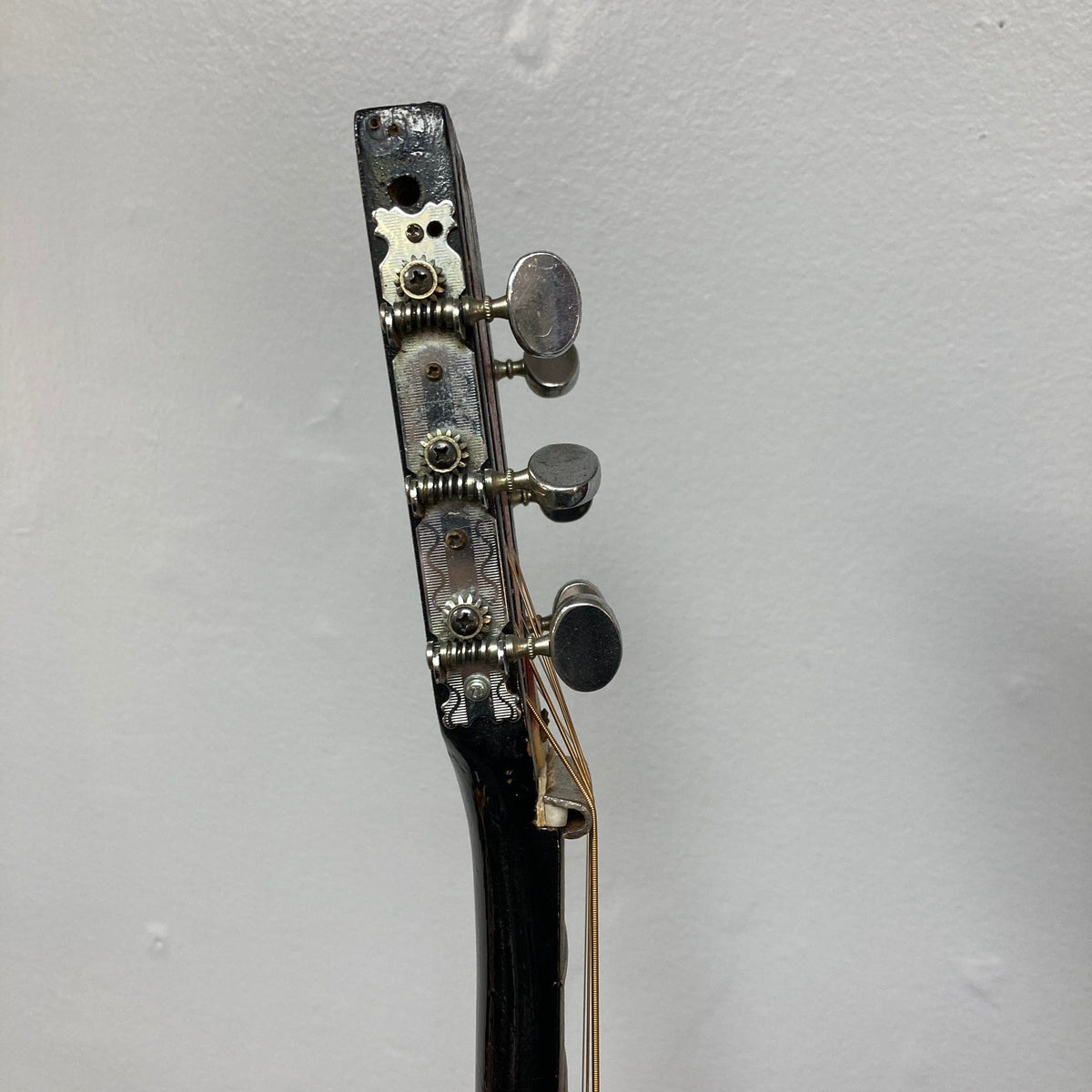 Dobro Model 60 DS Round Neck 1970s Red Burst, showing detailed close-ups of the guitar's back and resonator parts, highlighting its traditional design and used condition.