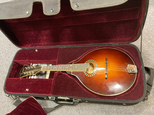 Eastman MD604-GB A-Style Oval-Hole Mandolin in its case, showcasing its elegant design and craftsmanship, perfect for musicians of all levels.