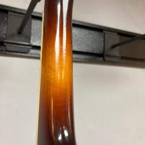 Close-up of the Eastman MD604-GB A-Style Oval-Hole Mandolin neck, showcasing its fine wood craftsmanship, perfect for musicians. Case included.