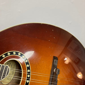 Close-up of the Eastman MD604-GB A-Style Oval-Hole Mandolin, showcasing detailed craftsmanship and strings, ideal for musicians. Comes with a protective case.