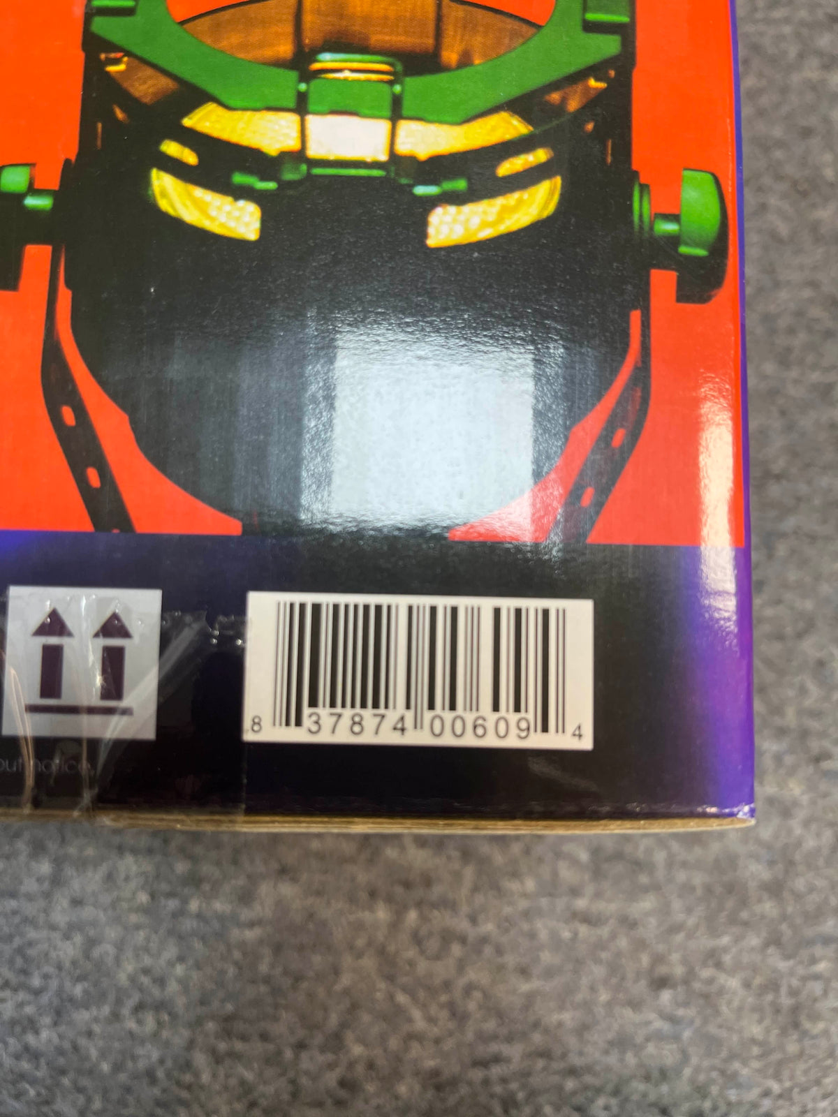 A close-up of an Elation Professional OPTI 30 Compact & Powerful Opti-PAR Fixture box shows the barcode 8378741006094 and a colorful graphic, hinting at its use in professional stage lighting.