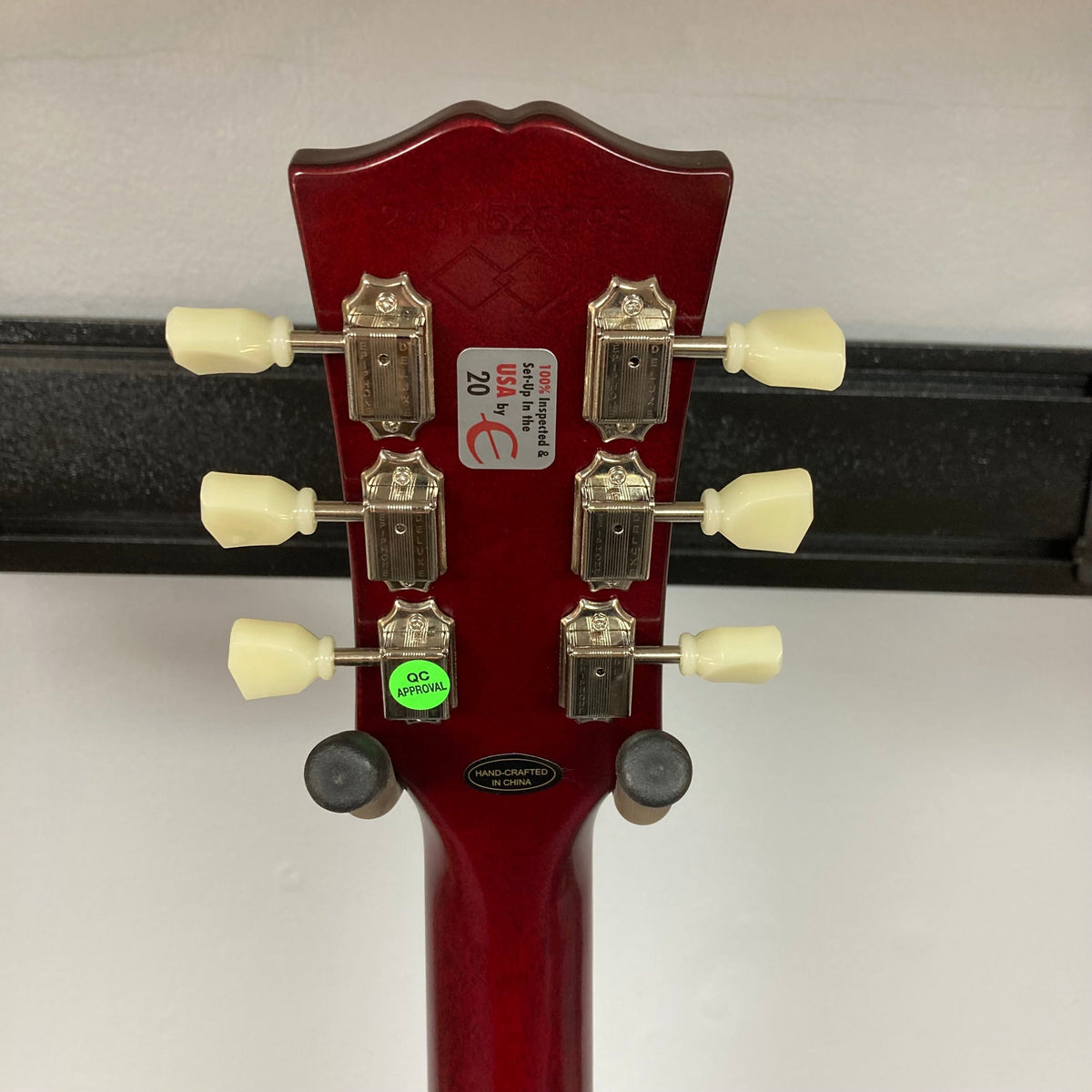 Epiphone 1959 Les Paul Standard Iced Tea Inspired by Gibson, close-up of guitar body showing mahogany construction and AAA flame maple top.