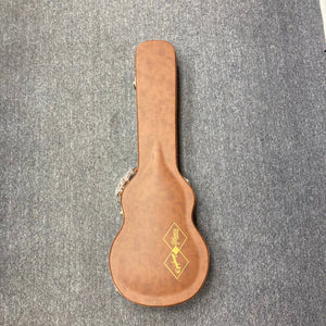 Epiphone 1959 Les Paul Standard Iced Tea Inspired by Gibson, shown in its vintage-style brown hardshell case on a grey carpet.