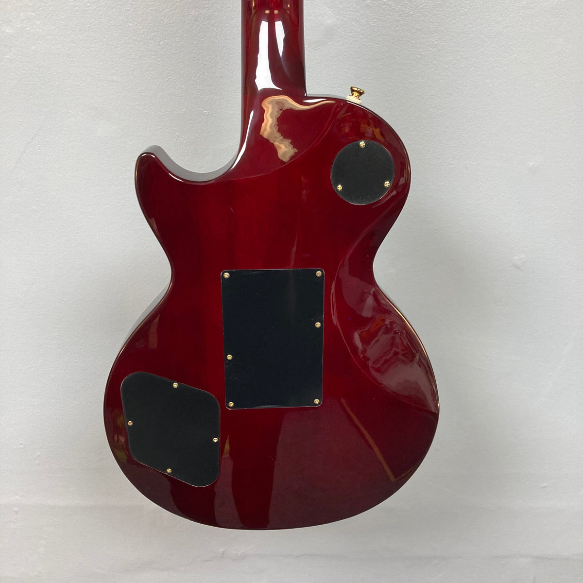 Epiphone Alex Lifeson Les Paul Custom Axcess w/Case, featuring a red body, gold hardware, and Floyd Rose tremolo.