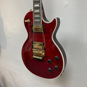 Epiphone Alex Lifeson Les Paul Custom Axcess w/Case, featuring a red body with gold hardware and detailed close-ups of strings and dials.