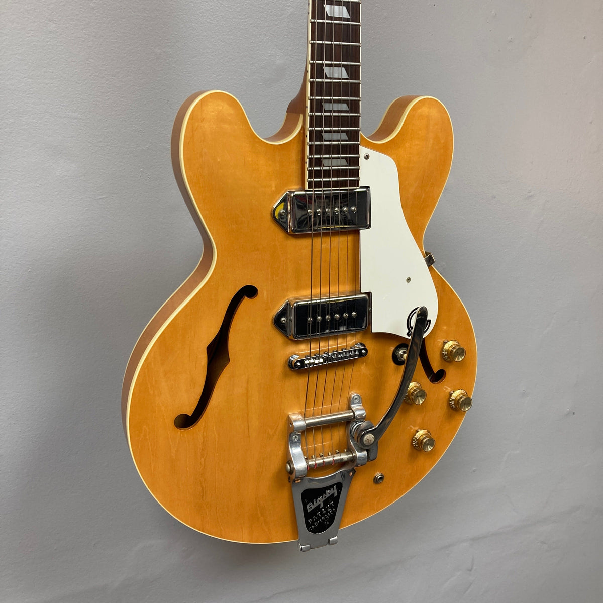 Epiphone Casino Reissue 1995 electric guitar on display, showcasing its hollow-body design and classic features.