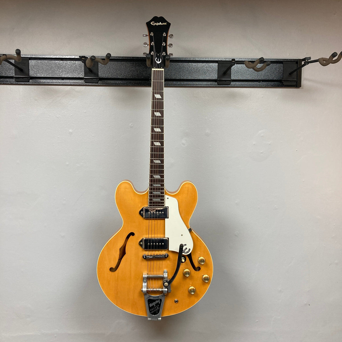 Epiphone Casino Reissue 1995 on display; hollow-body electric guitar with P-90 pickups, rosewood fretboard, and sunburst finish, available at Guitars on Main.