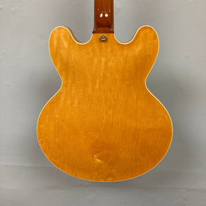 Close-up of 1995 Epiphone Casino Reissue guitar, highlighting the hollow-body design and dual P-90 pickups, a classic choice for collectors.