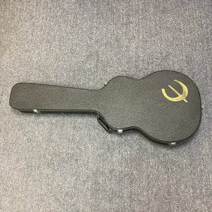 Epiphone Casino Reissue 1995 guitar in black case on grey carpet, highlighting its iconic design and craftsmanship, available via Guitars on Main consignment.