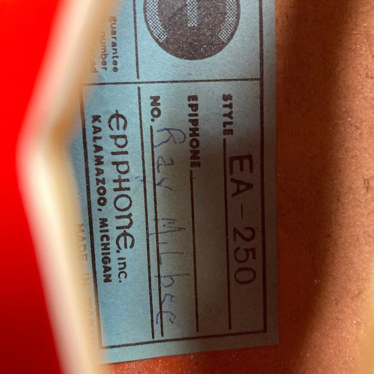 Close-up of the Epiphone EA-250 1972 - 1974 label, highlighting its Japanese craftsmanship and vintage appeal.