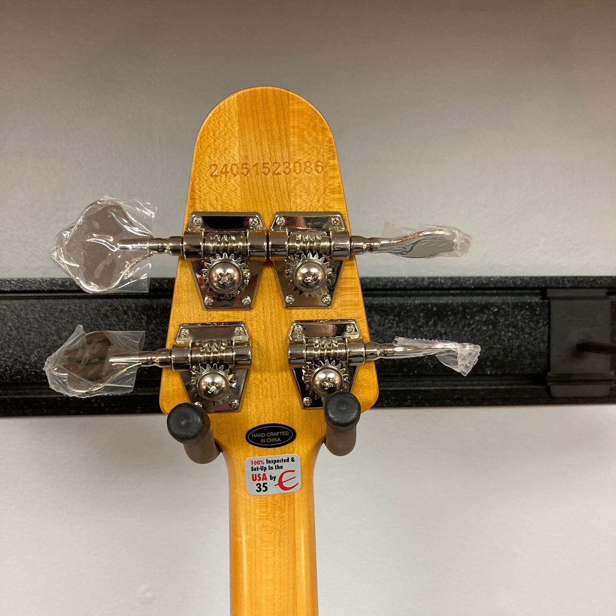 Epiphone Grabber Bass Ebony close-up, showcasing its sleek alder body, bolt-on maple neck, and hardware details, highlighting vintage flair with modern playability.