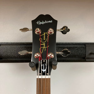 Epiphone Jack Casady Fretless Bass - Aged Royal Tan, featuring a close-up of the guitar head with strings and tuning pegs, showcasing its craftsmanship.