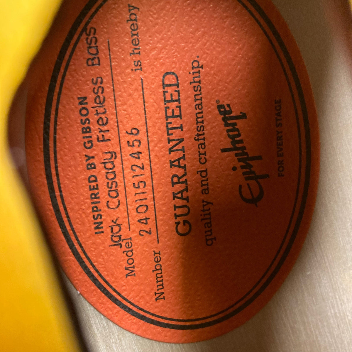 Epiphone Jack Casady Fretless Bass - Aged Royal Tan, archtop body, layered maple, cream binding, cream pickguard with E logo, nickel finish, gold speed knobs.