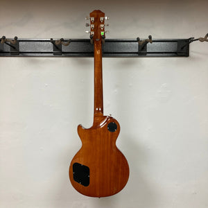 Epiphone Les Paul Modern Figured Mojave Burst guitar on display, featuring ProBucker pickups and Grover Locking Rotomatic tuners, includes a gig bag.