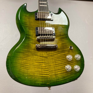 An Epiphone SG Modern Figured electric guitar in Iguana Burst with ProBucker humbuckers, four control knobs, a flamed maple top, and a tune-o-matic bridge is pictured against a plain background. Comes with gig bag.