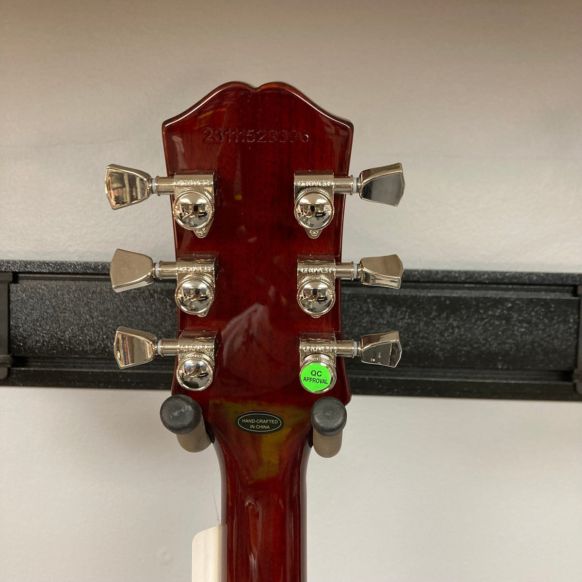 Epiphone SG Modern Figured Mojave Burst guitar, close-up view, showcasing mahogany body, maple cap, and ProBucker pickups, includes premium gig bag.